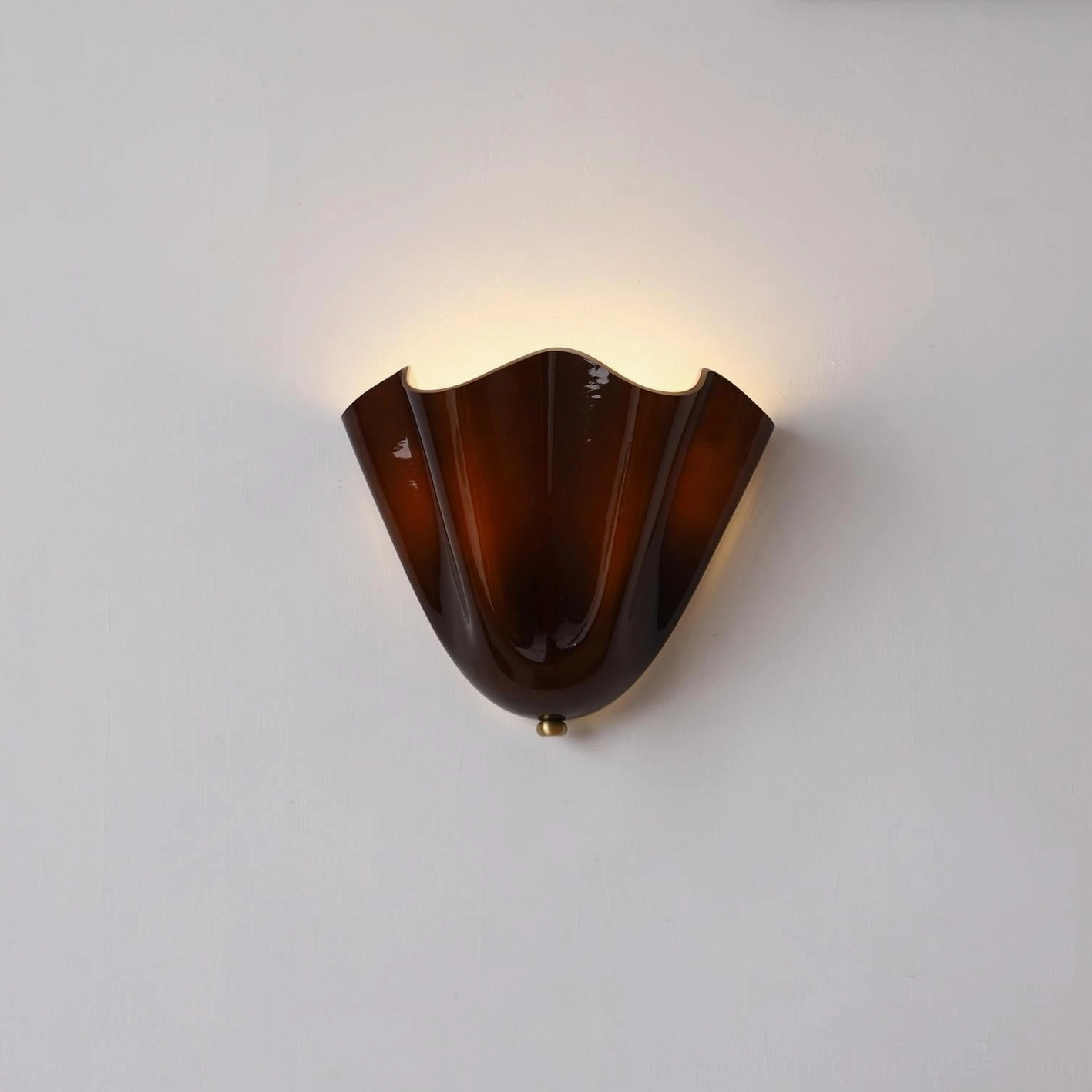 Vera brown glass wall sconce product display highlighting rich earthy glass tone and light diffusion