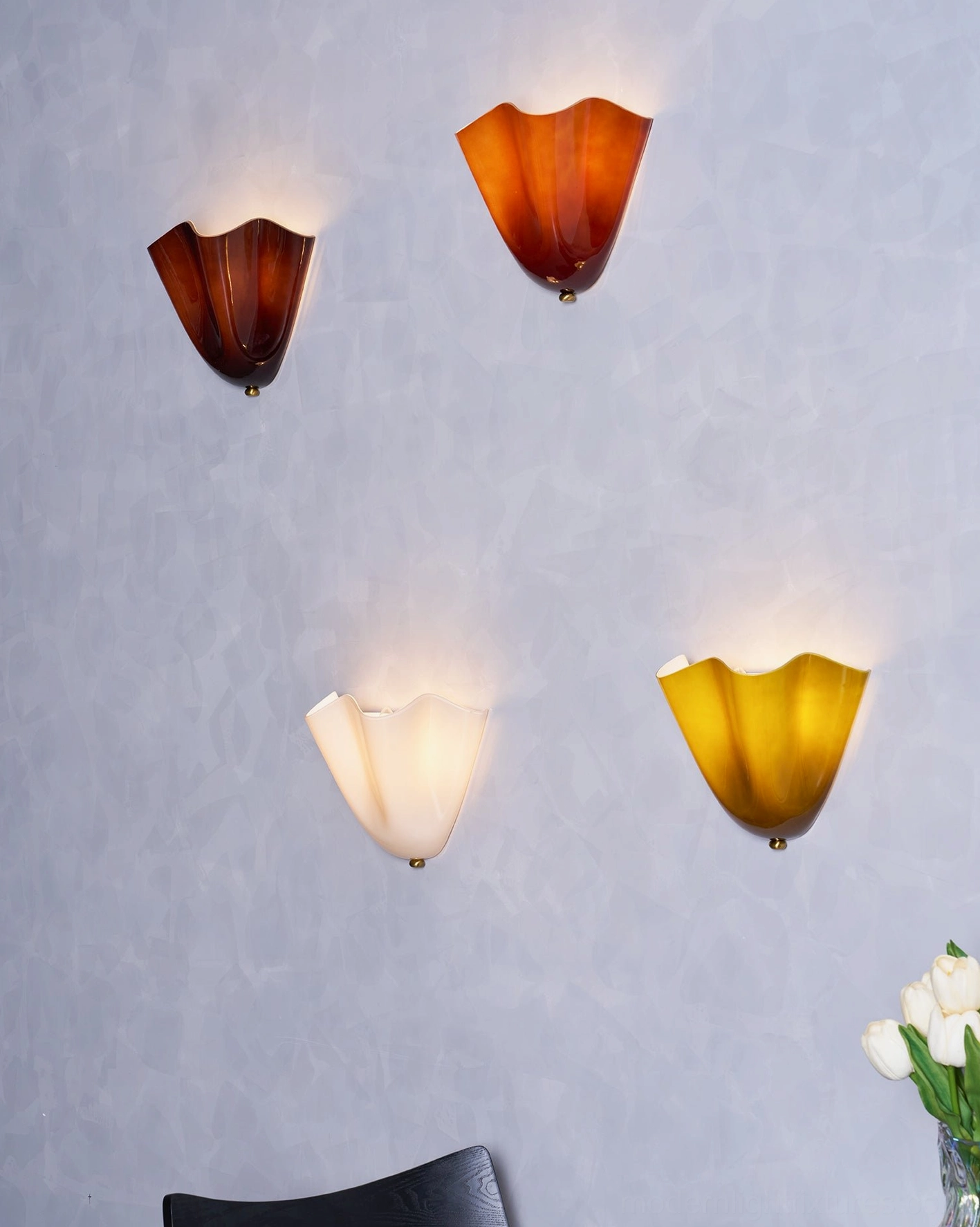 Vera brown glass wall sconce providing warm earthy illumination in transitional home design style