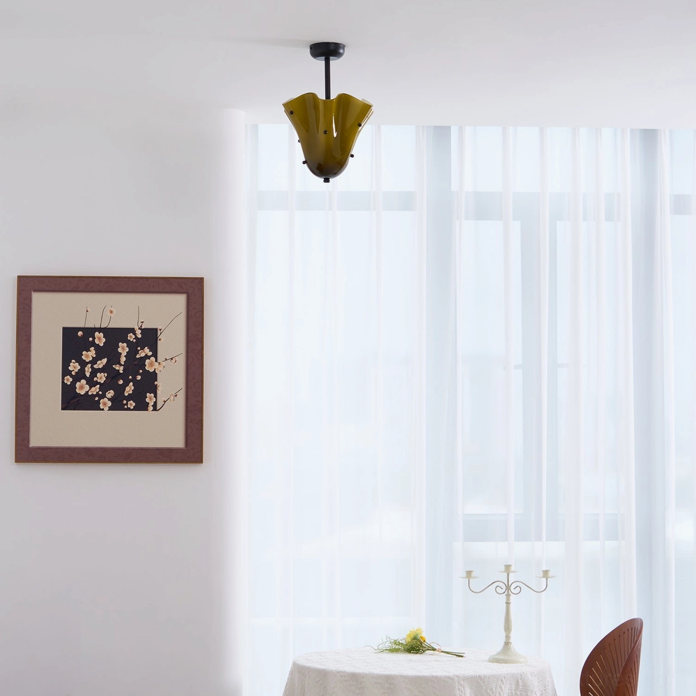 Vera hand-shaped glass ceiling light detail showing ruffled texture and metal stud embellishments