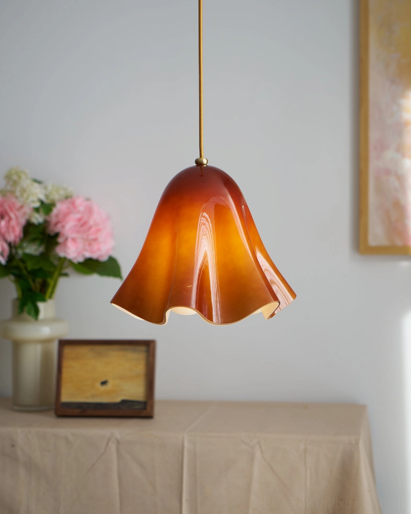 Vera glass pendant light artistic composition showing sculptural form and light transmission properties