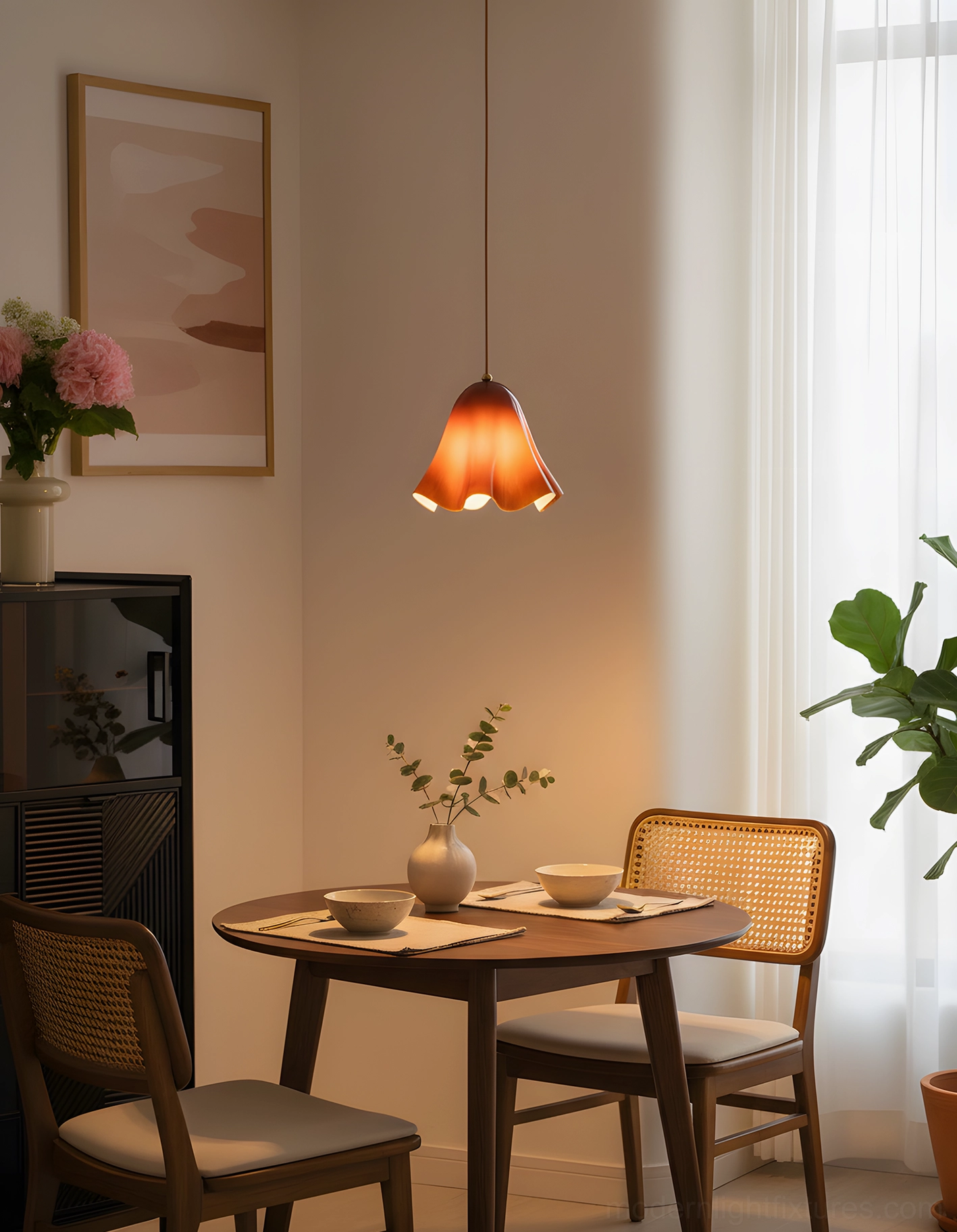Vera glass pendant light installation view with adjustable cord in modern residential interior