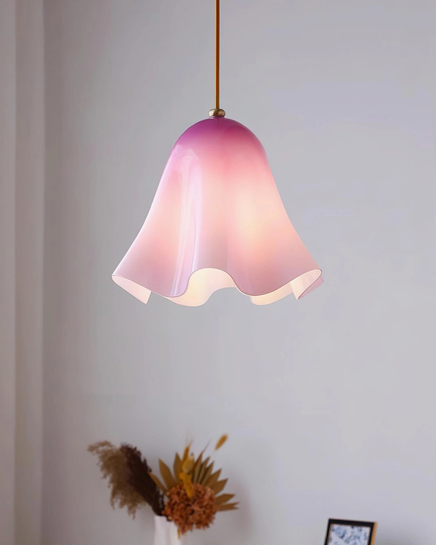 Vera green glass pendant light in modern kitchen providing warm task and ambient lighting
