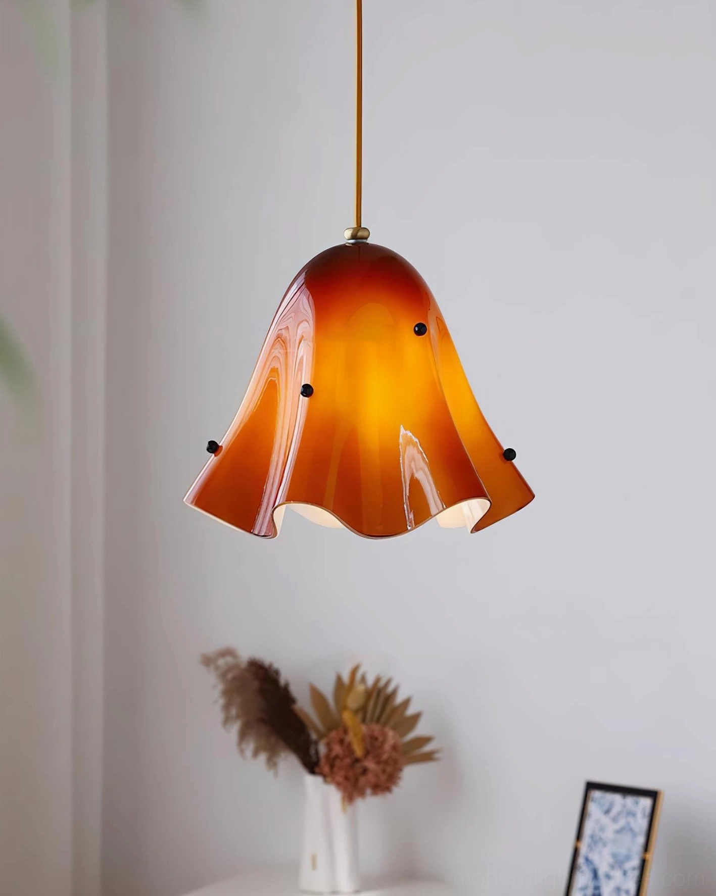 Vera pendant light multi-pendant cluster installation above kitchen island workspace