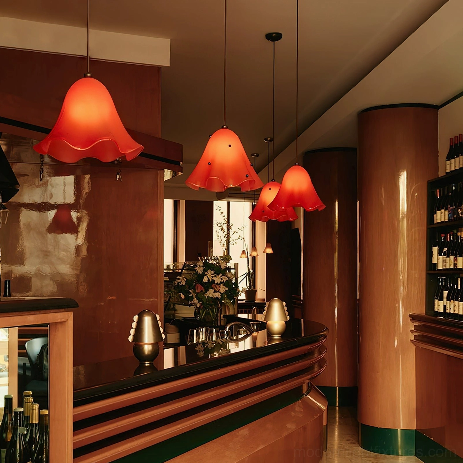 Multiple Vera red pendant lamps with ruffled glass shades in retro bar restaurant with warm wood interior