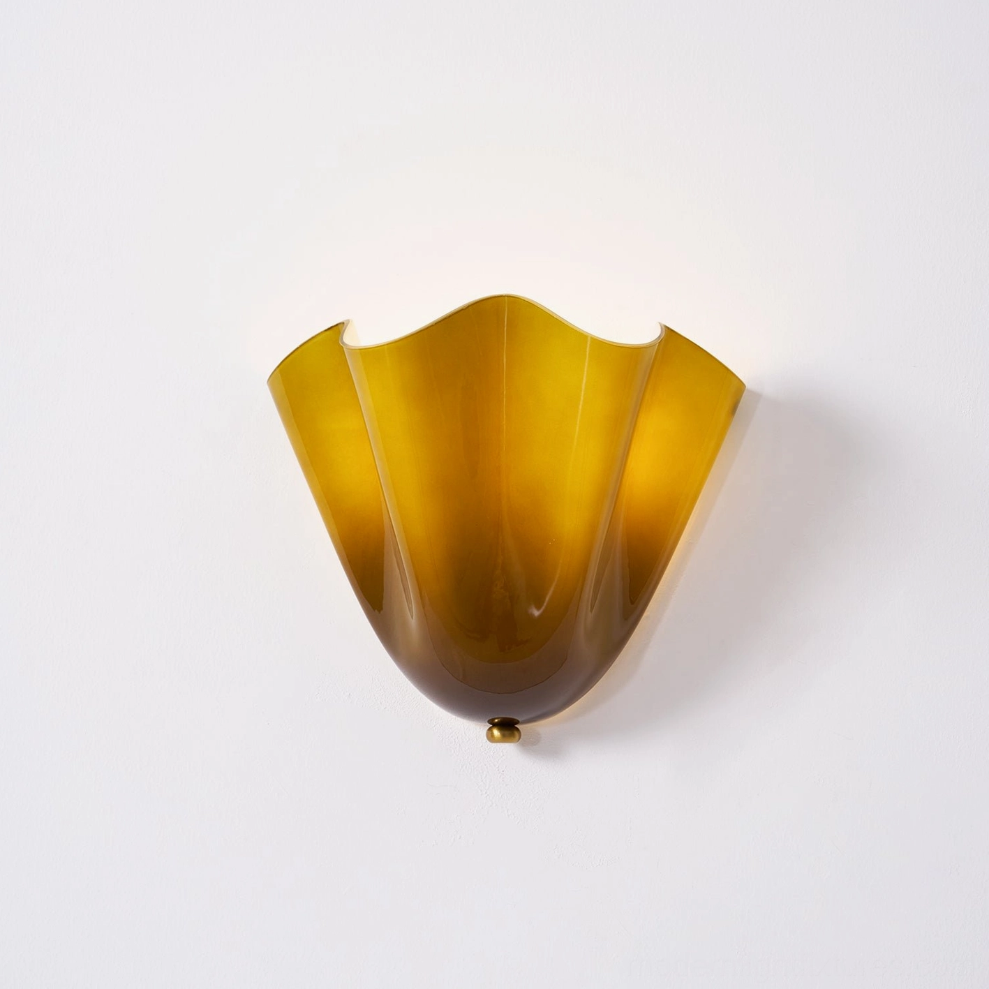 Vera wall sconce installed as accent lighting element in contemporary eclectic interior design scheme