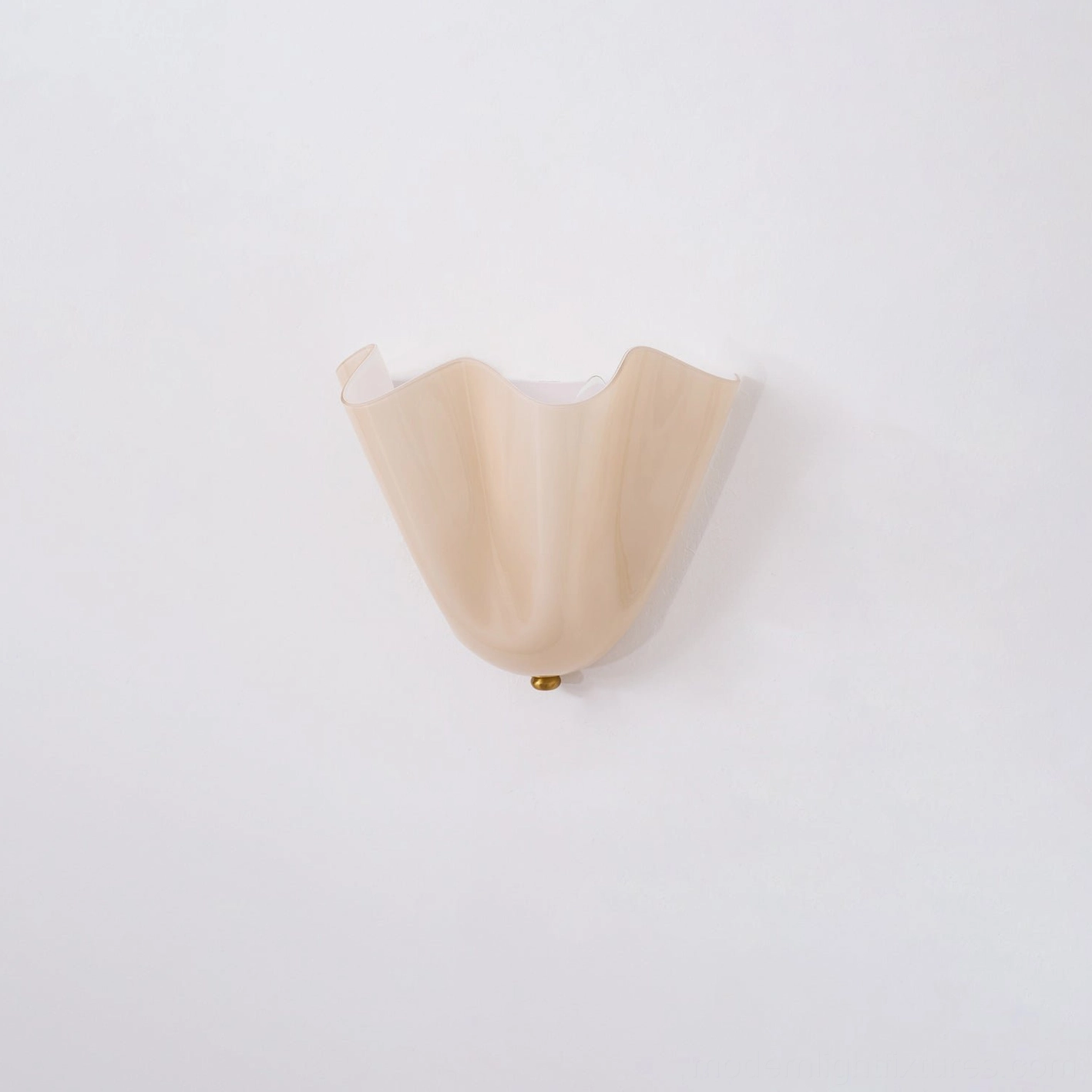 Vera wall sconce installed in coastal style interior with light neutral decor and natural materials