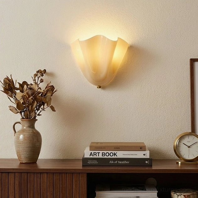 Vera beige glass wall sconce installed in hallway creating warm ambient lighting for transitional space