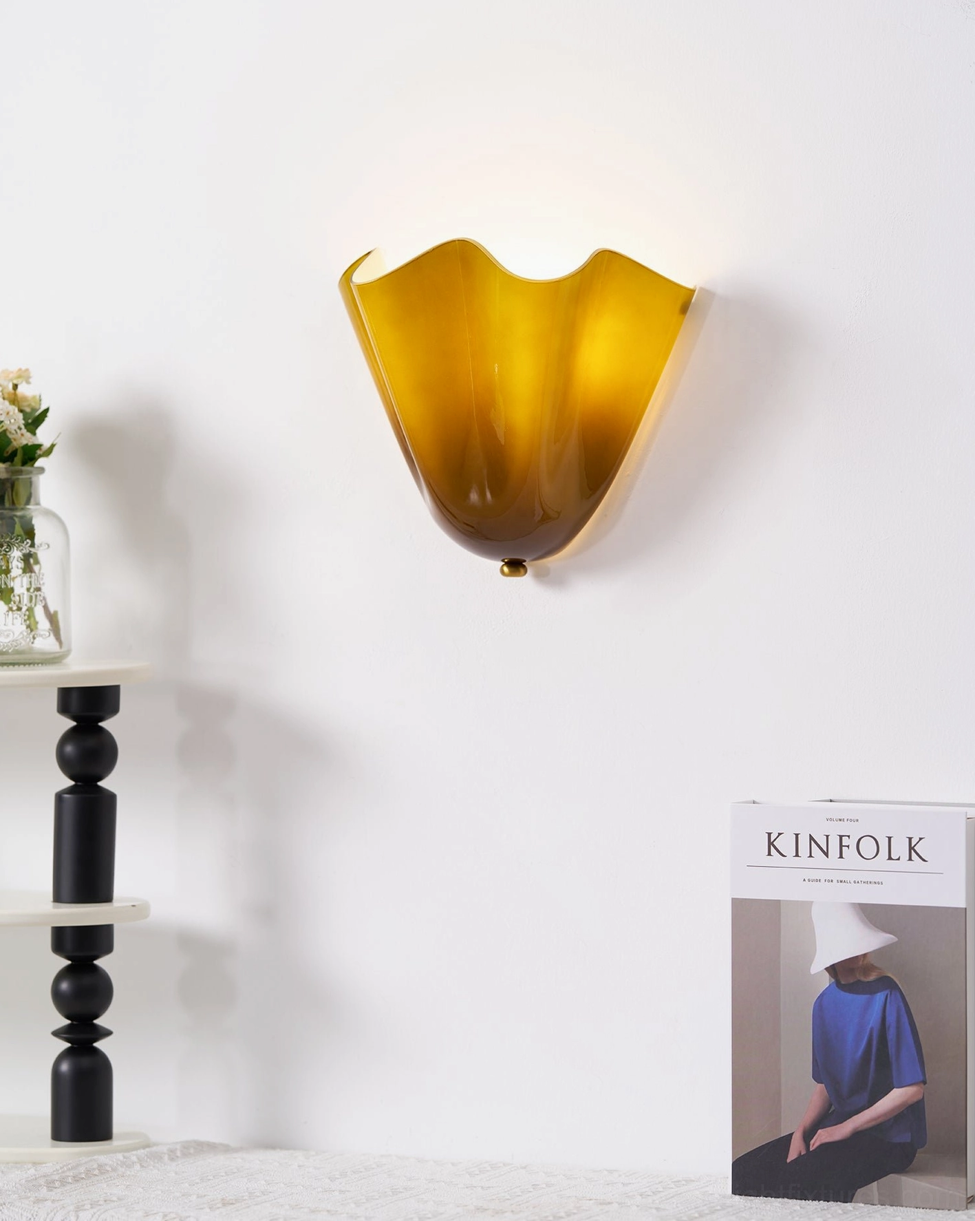 Vera wall sconce product shot on white background showing complete fixture form and scale proportion