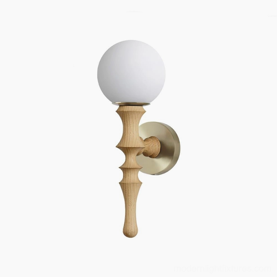Vero wall sconce in natural wood color with polished brass accents and soft-diffused frosted glass globe