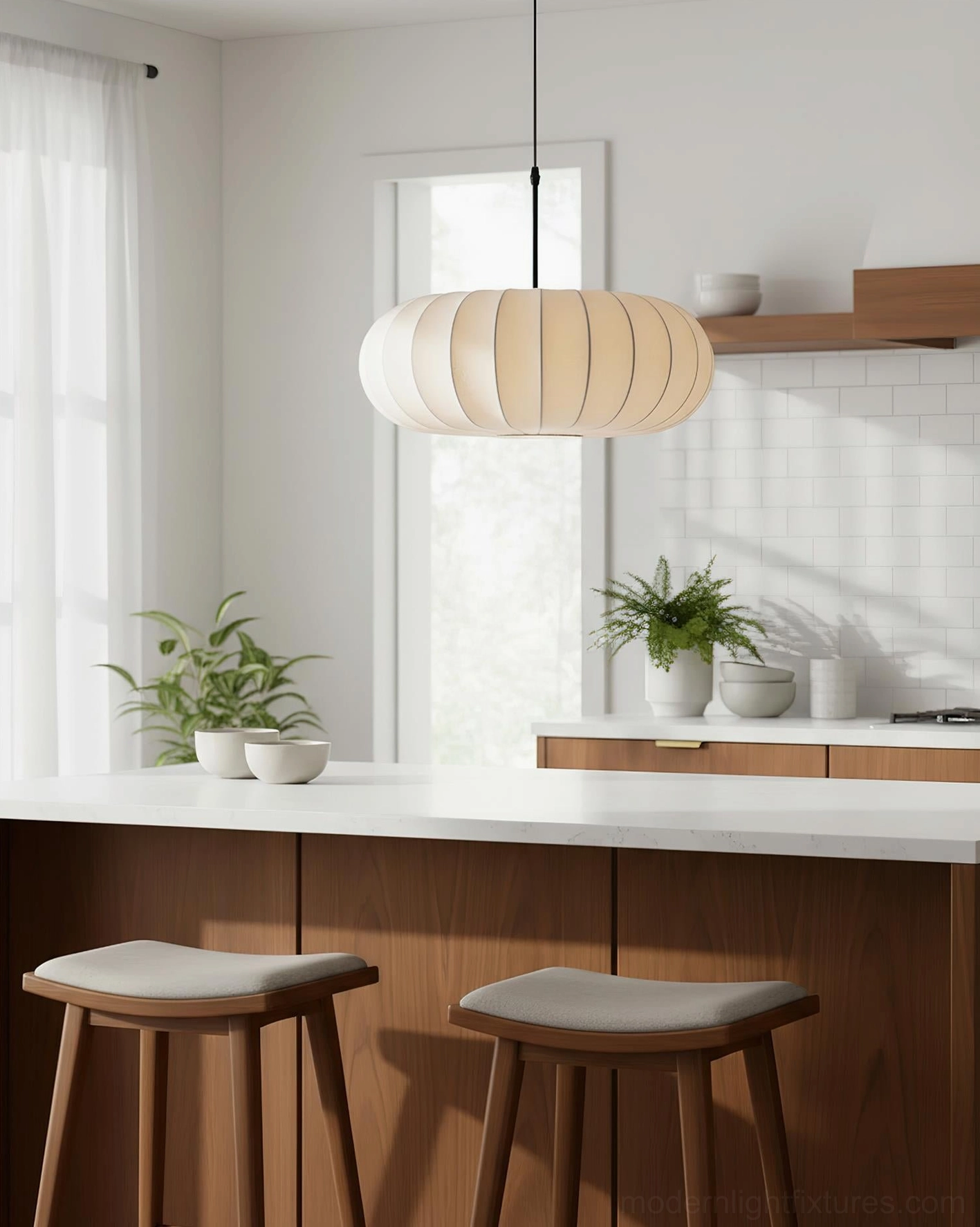 Verona fabric pendant lamp in bright kitchen space with natural daylight, side angle showing beige ribbed shade and wooden stools