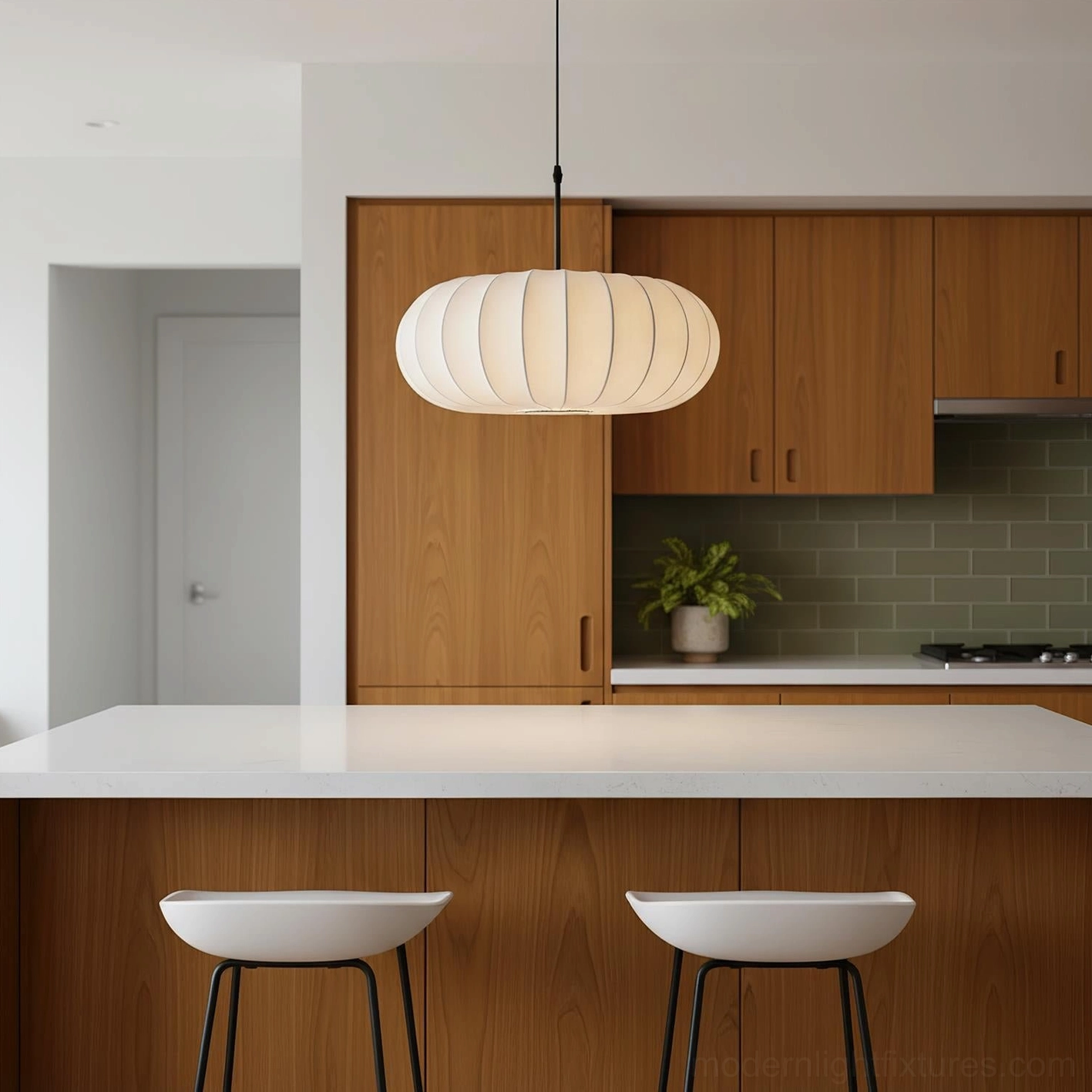 Verona pendant light hanging over kitchen island with wooden cabinetry and warm fabric diffuser creating intimate dining illumination