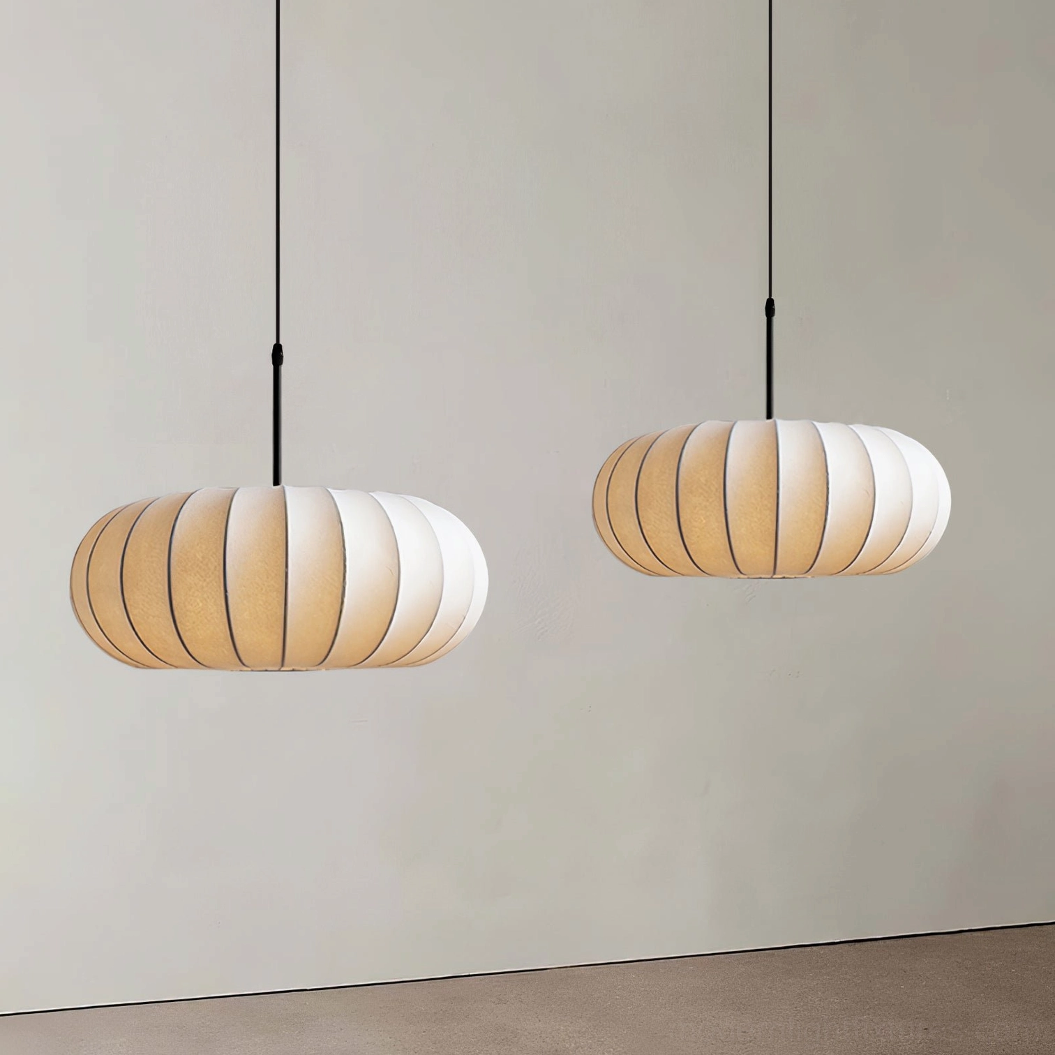 Verona pendant light large size installation in open-plan contemporary home, warm illumination over dining and living zones