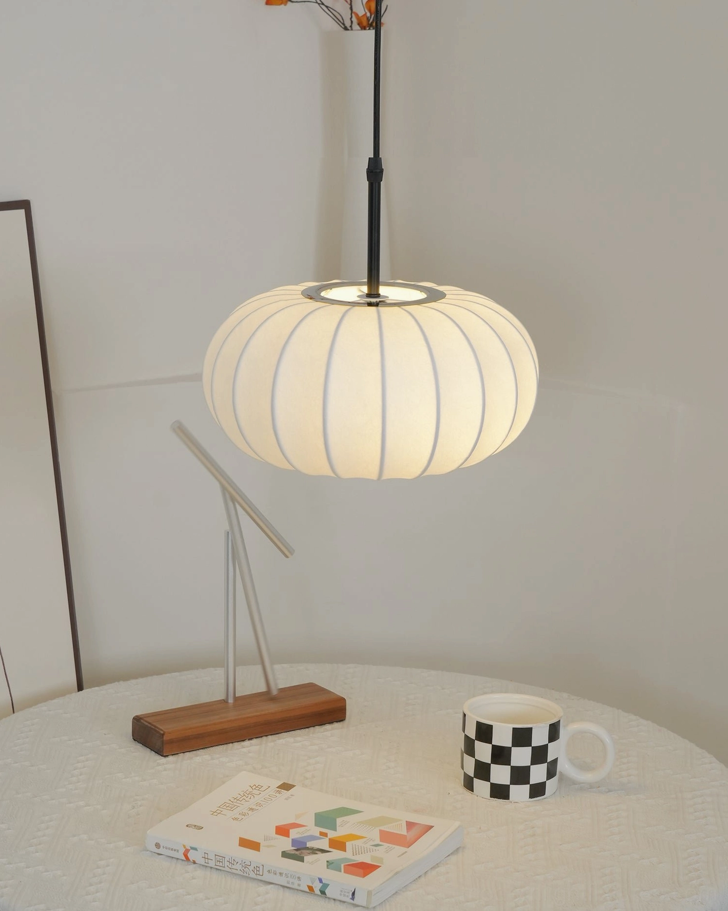Verona pendant light mounted on vaulted or sloped ceiling, demonstrating level hanging and angled ceiling compatibility