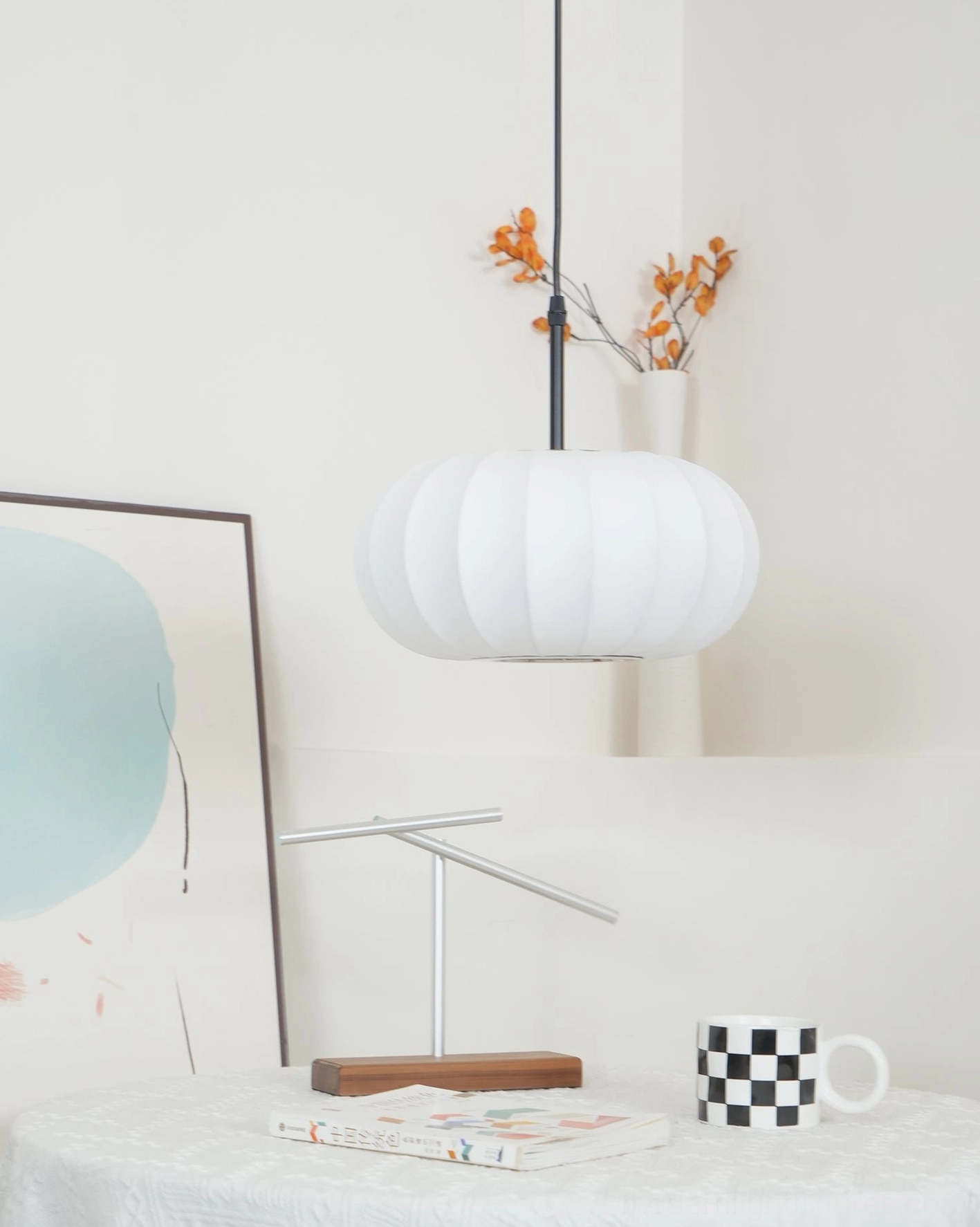 Verona pendant light suspended view showing suspension wire and shade proportions from below in contemporary interior