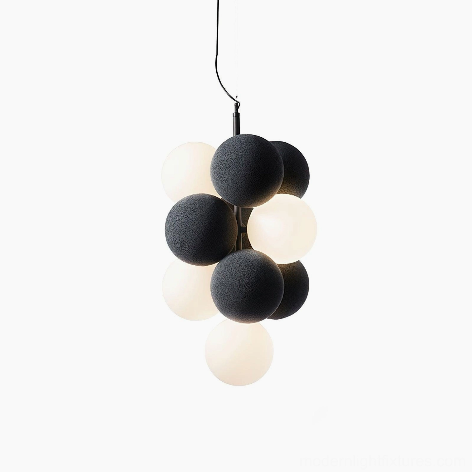 Vertical compact bubble pendant light installation in intimate bedroom nook accent lighting