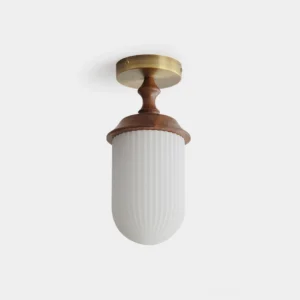 Veyra brass ceiling light fixture with opal ribbed glass globe and walnut wood accents, front view on white background