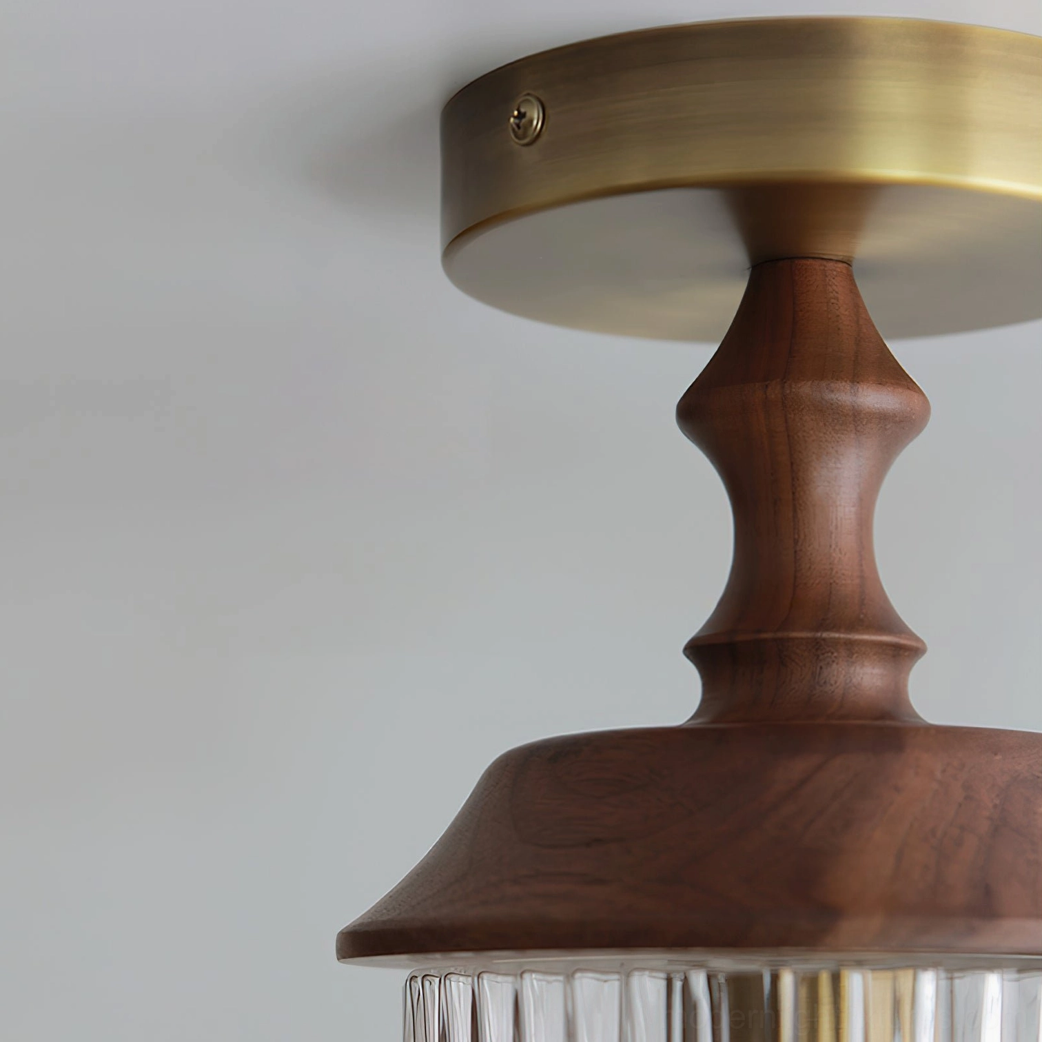 Veyra ceiling light fixture clear glass option with light wood and brass accents, product display angle