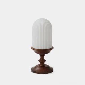 Veyra ribbed glass table lamp with dark wood base front view white studio background