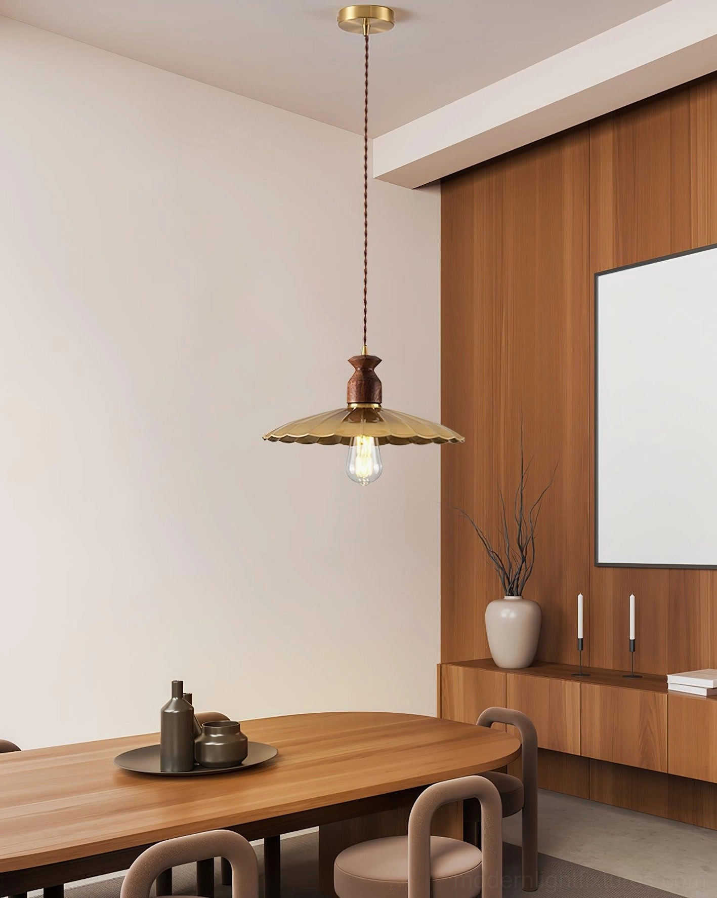 Viana scalloped edge pendant light three-quarter side view in wood-paneled dining room with Edison bulb detail