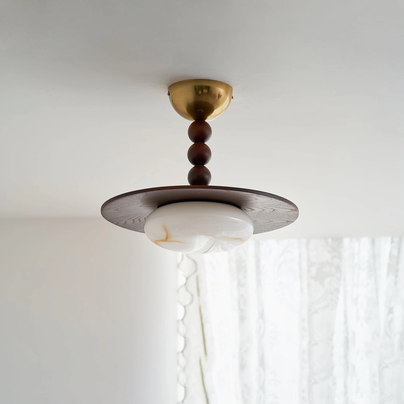 Vicenza ceiling light bringing soft 3000K warmth to bright modern living space