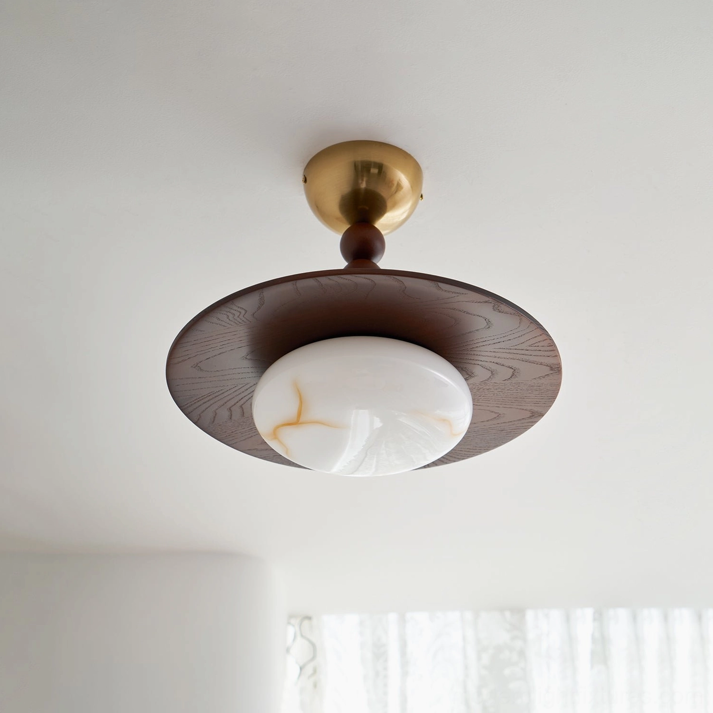 Vicenza mid-century modern ceiling light with beaded stem detail in living space