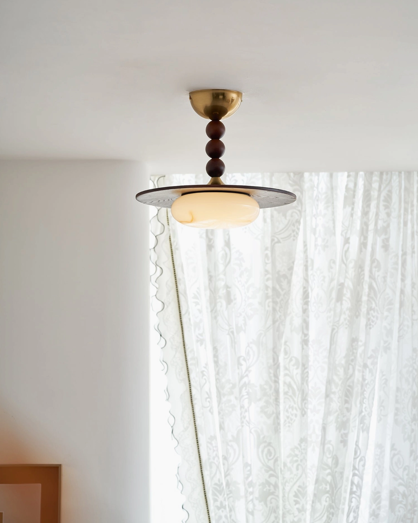 Vicenza damp-rated ceiling light in kitchen over countertop workspace