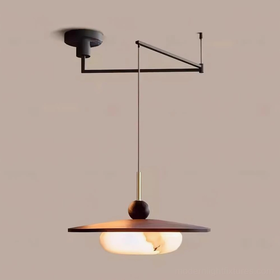 Vicenza adjustable swing arm pendant showing flexible positioning over dining and work surfaces