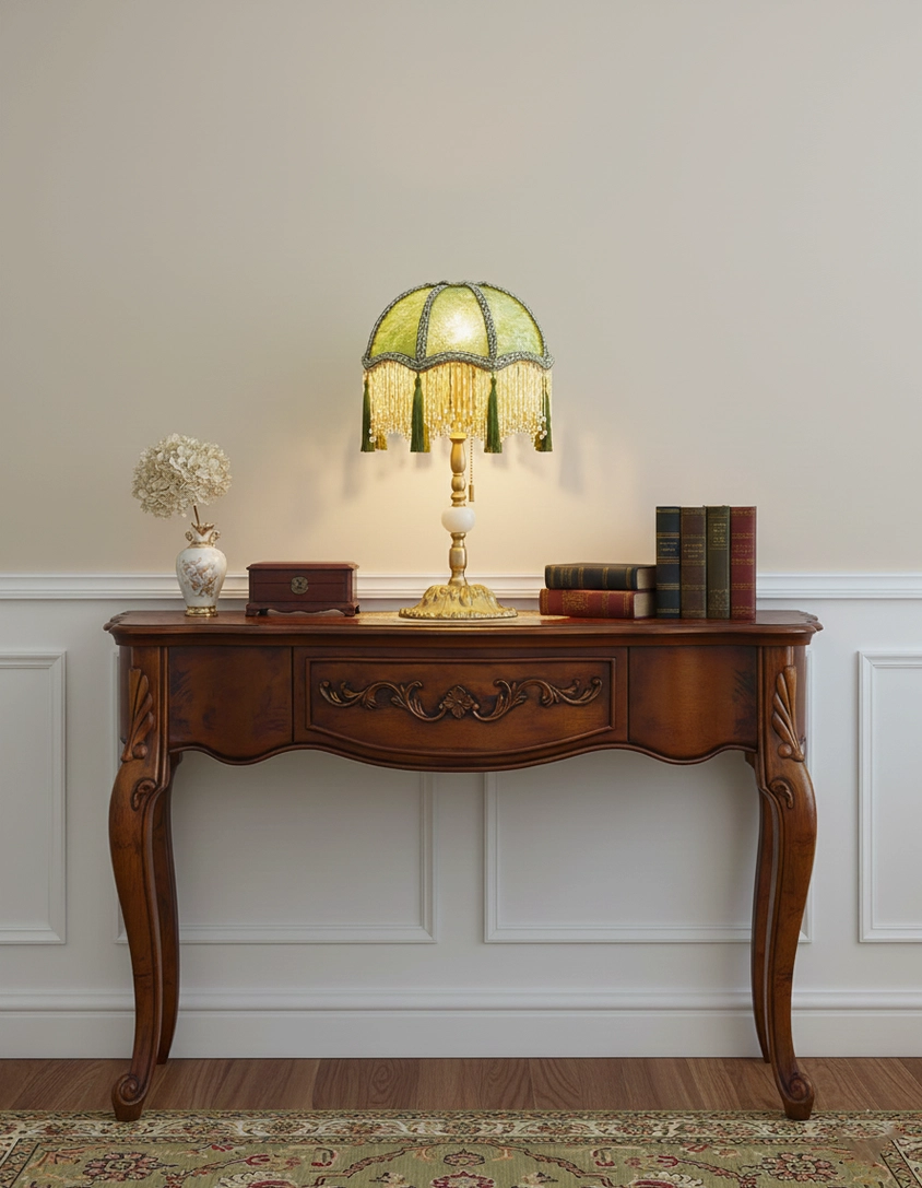 Victorian-style emerald green velvet table lamp showcasing jade stone accents and tassel trim details
