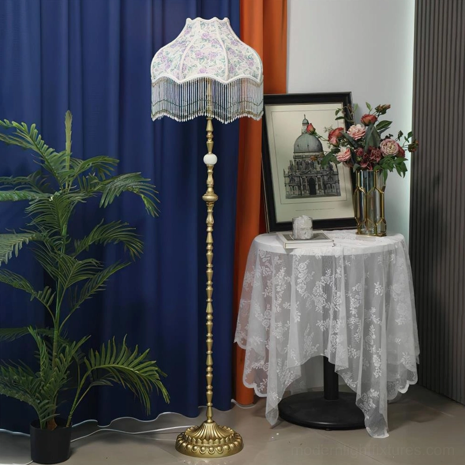 Purple floral Victorian floor lamp with gold stand in luxury home corner setting