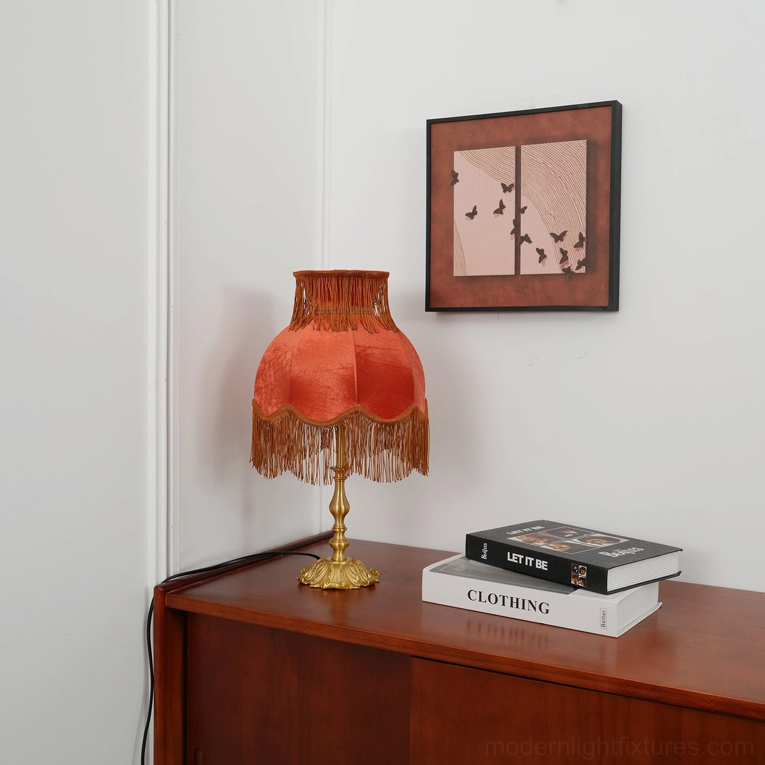 Victorian tassel table lamp with elegant velvet shade featuring intricate tassel embellishment
