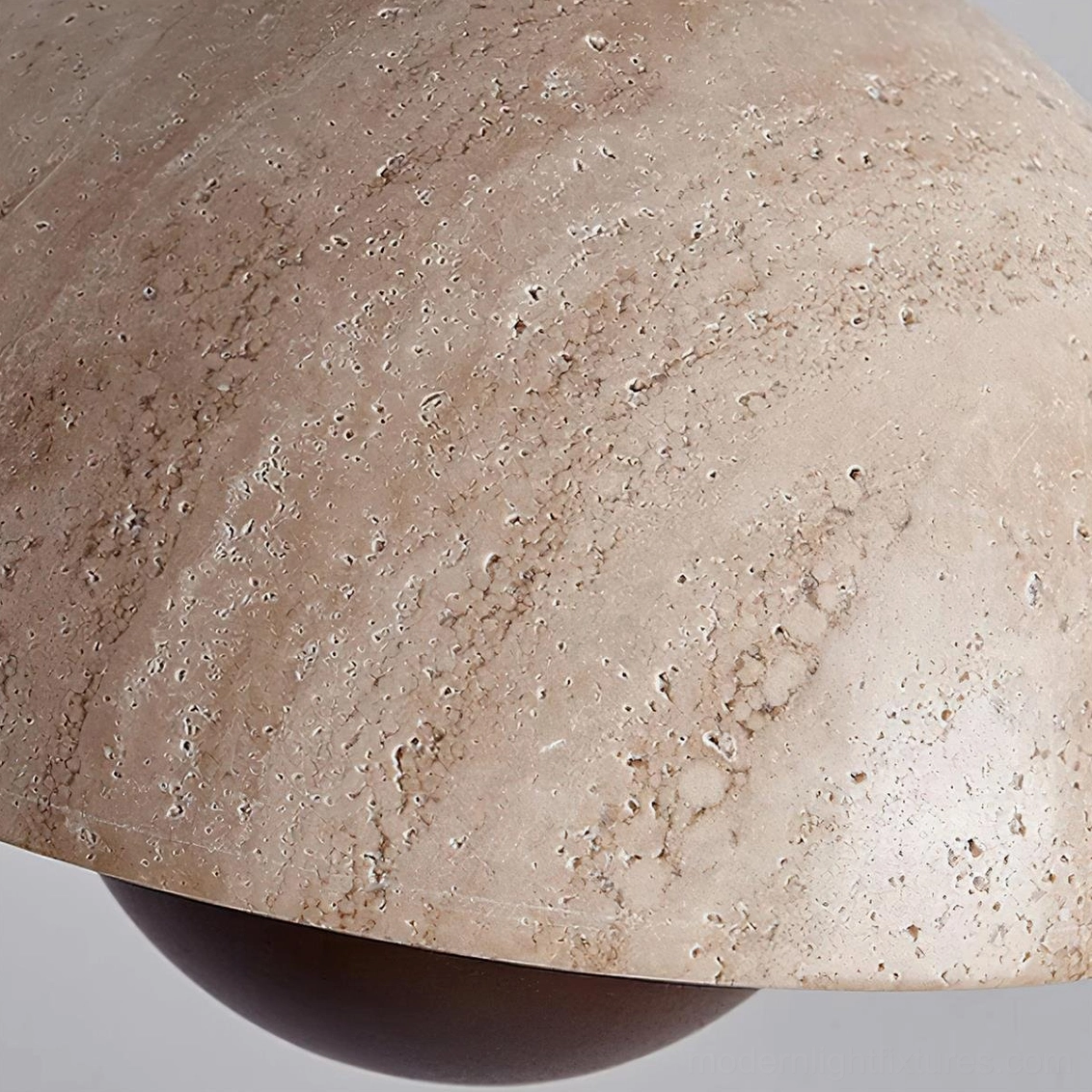 Vienna pendant light in beige travertine creating ambient illumination in transitional interior space