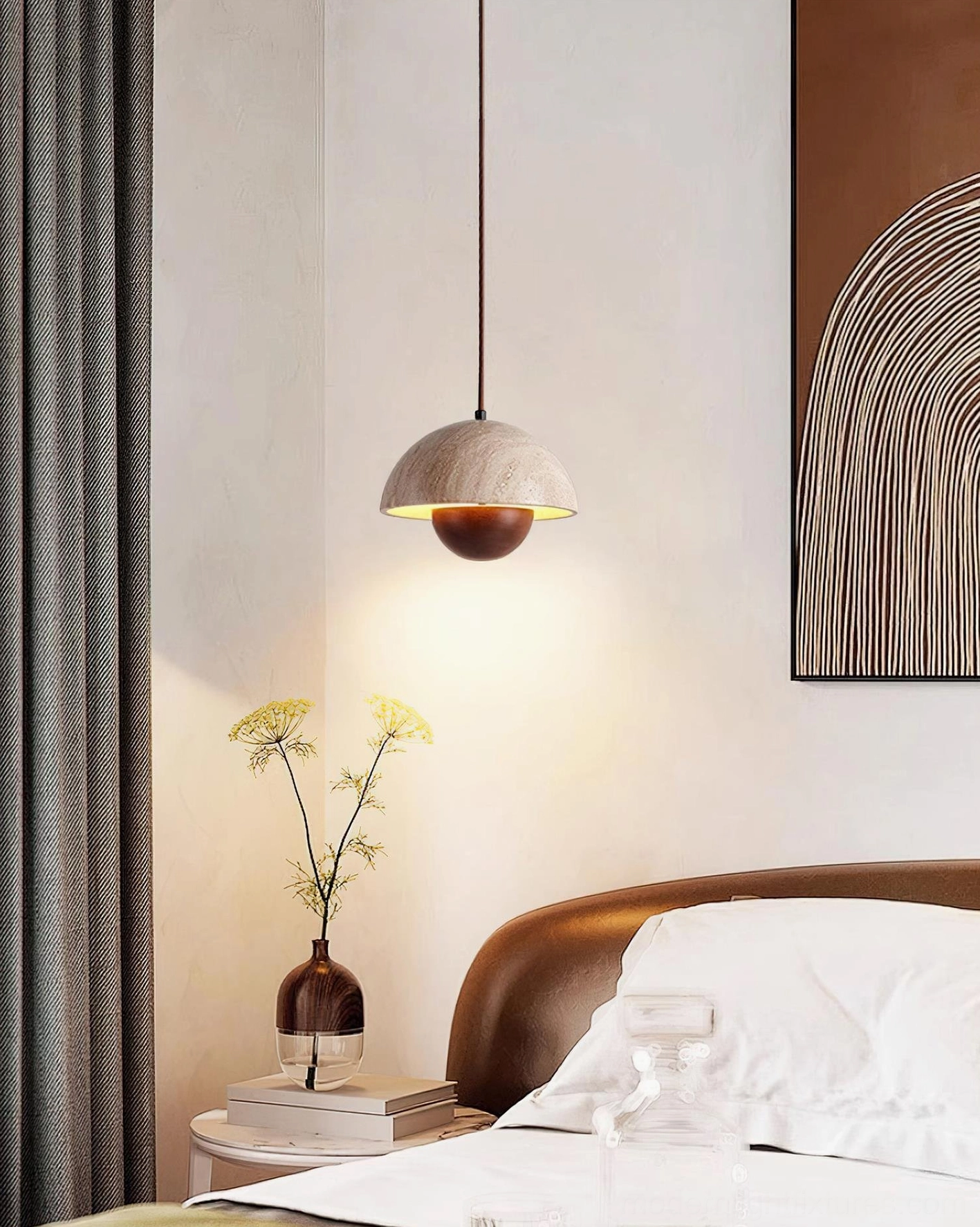 Vienna travertine pendant light installed in modern wabi-sabi bedroom beside leather bed frame