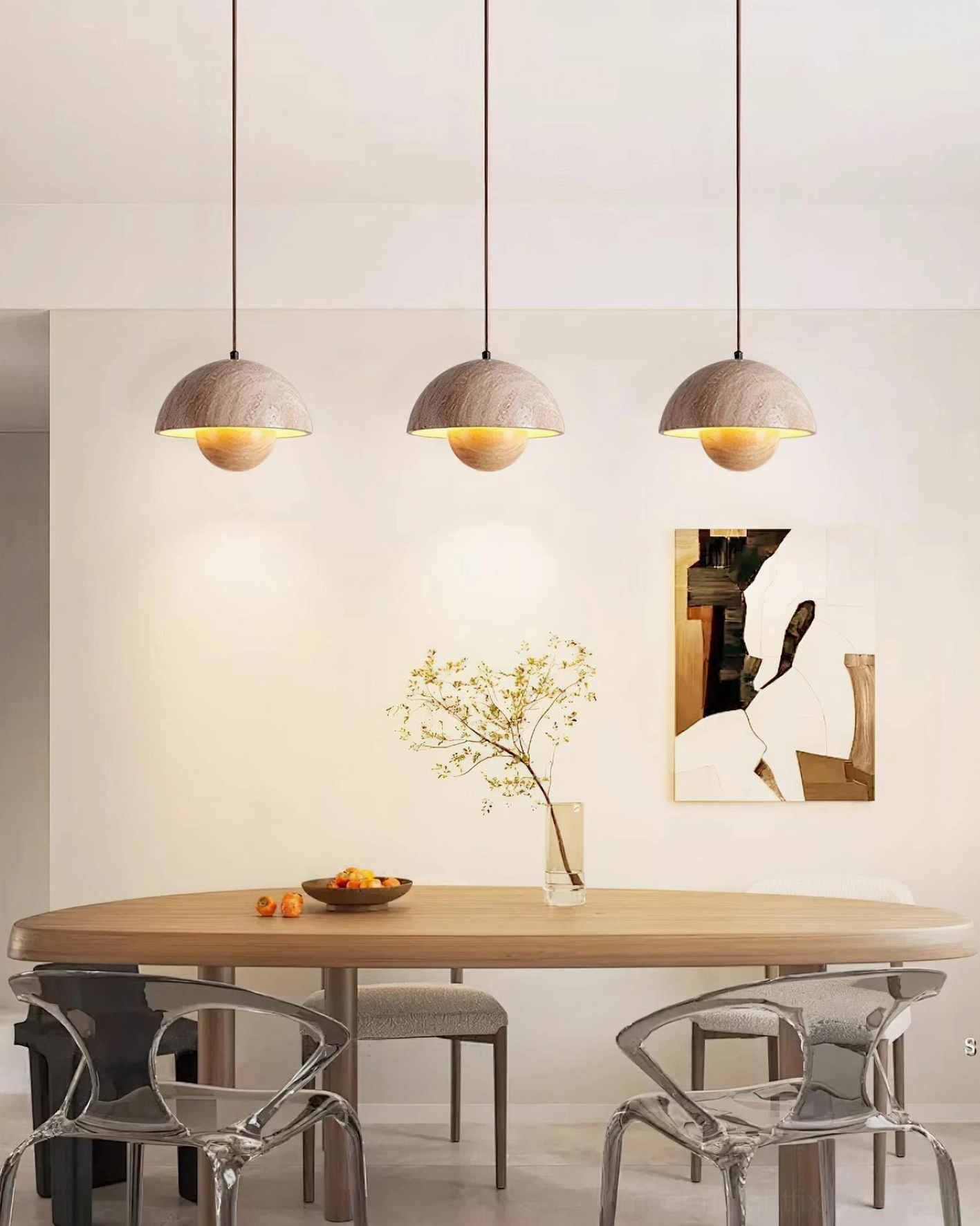 Multiple Vienna travertine dome pendant lights clustered above minimalist dining table in neutral space