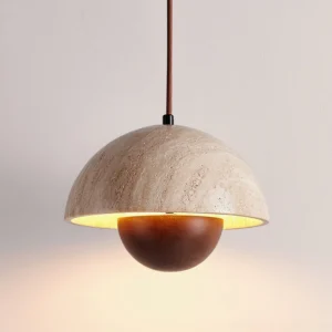 Close-up detail of Vienna pendant light showing travertine stone dome surface with warm LED glow interior