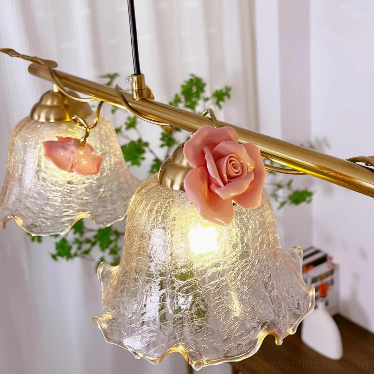 Vine Sonata 4-light dining chandelier with ornamental flowers and ruffled glass, warm brass fixture