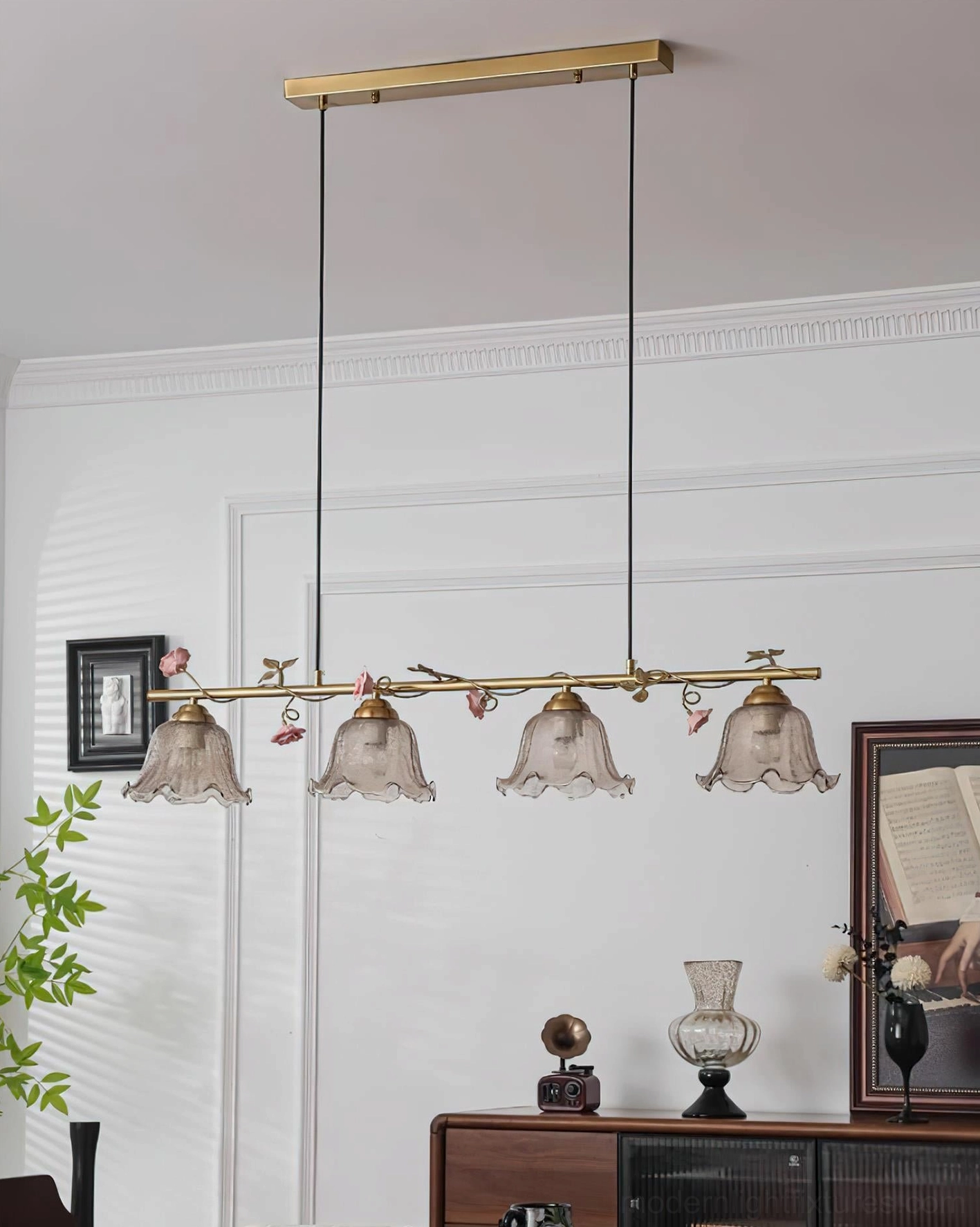 Floral linear dining chandelier with antique brass finish and ruffled glass shades, artistic botanical design