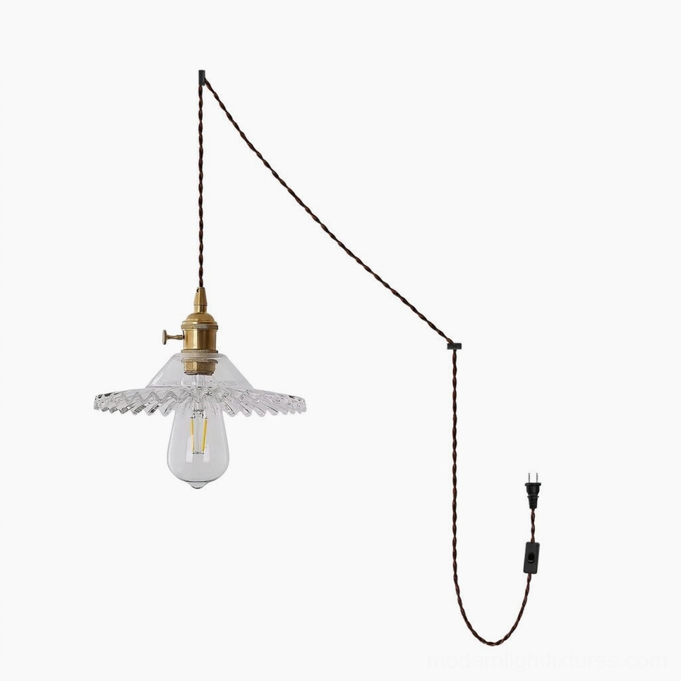 Clear glass Vines pendant light with sculptural gold vine frame and polished brass socket