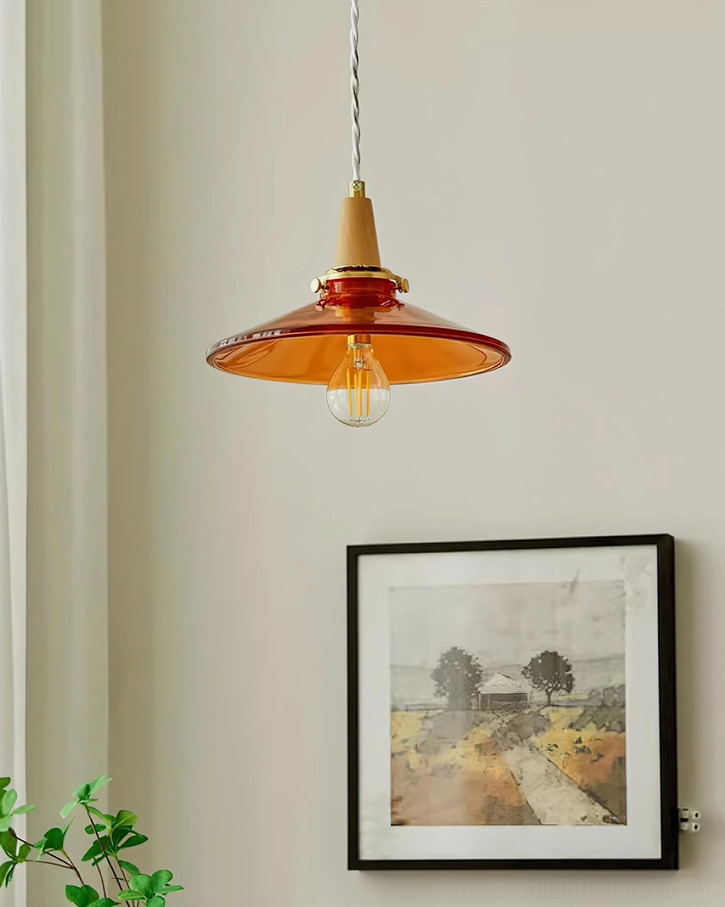 Vintage amber pendant lamp installed in home setting demonstrating warm ambient lighting and style
