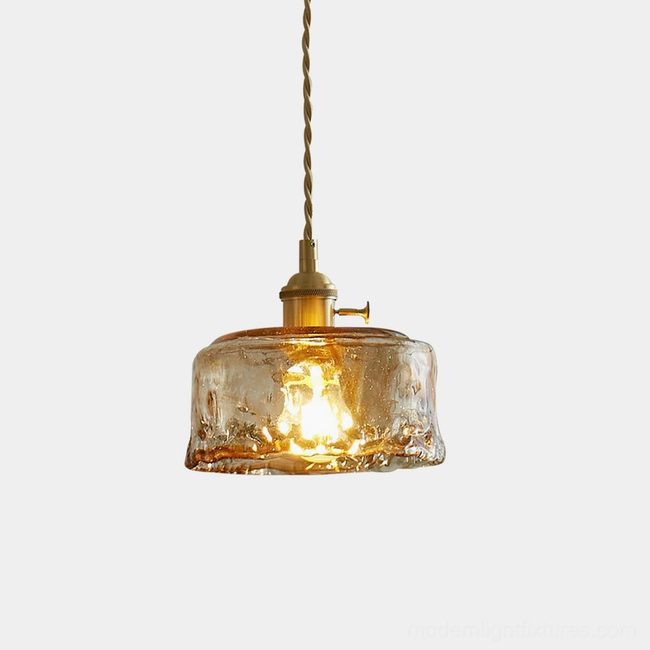Vintage Adonia amber glass pendant light with brass hardware - front close-up studio view
