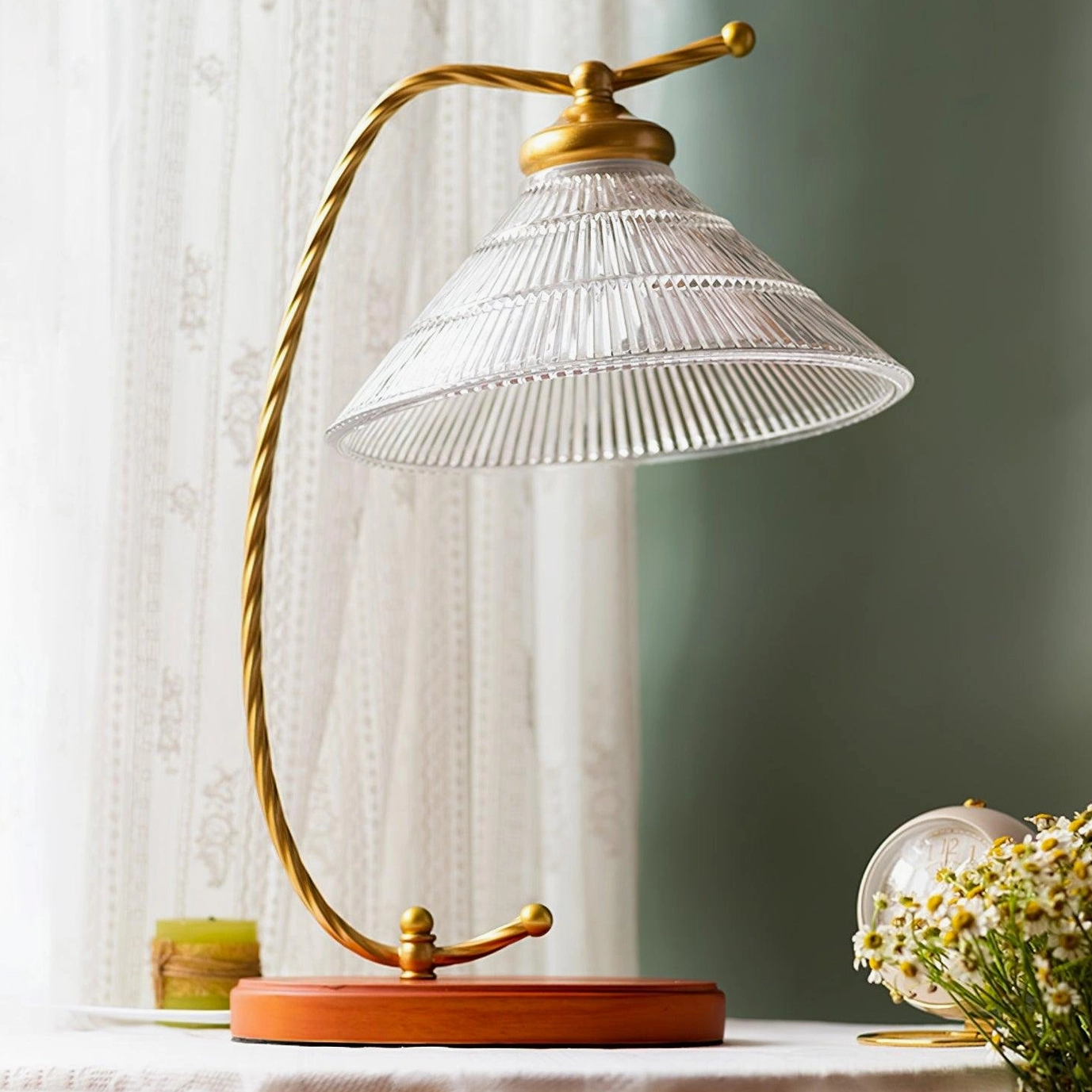 Vintage arc table lamp styled in contemporary interior showcasing retro design aesthetic with modern home furnishings