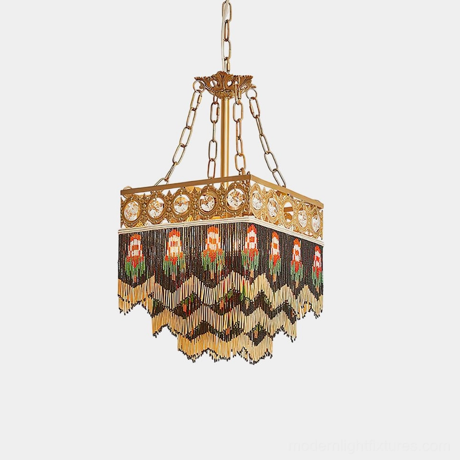 Mirello vintage beaded tassel pendant light with brass frame and crystal accents - front studio view