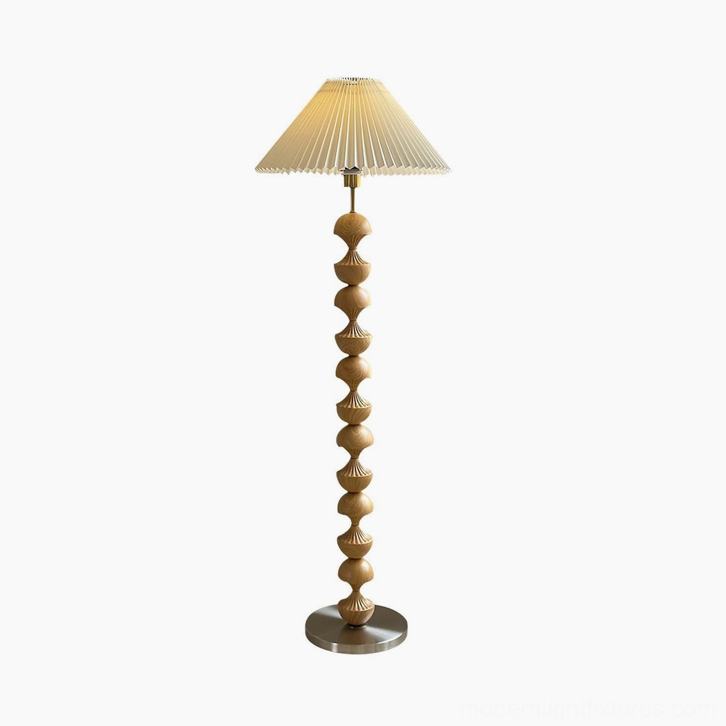 Full-height view of vintage beaded wood floor lamp with pleated cream shade and metal base in neutral interior space, sculptural design showcase