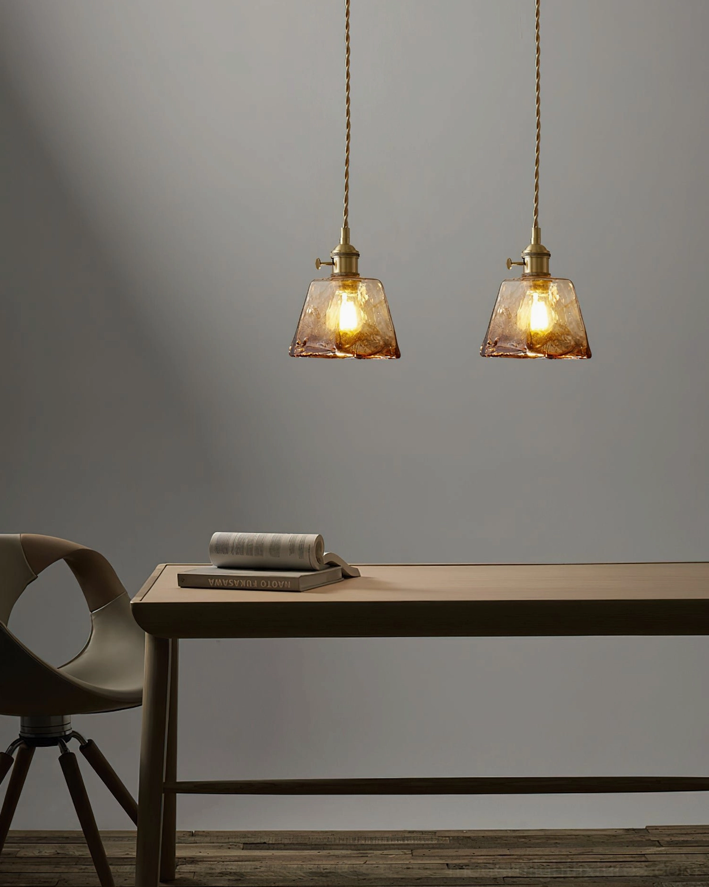 Vintage brass and amber pendant light in residential interior setting