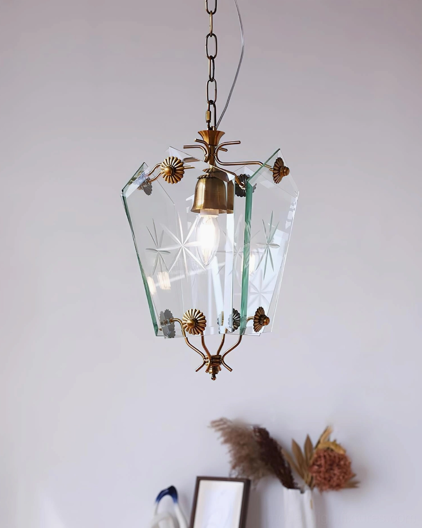 Vintage brass pendant lamp overhead view three-quarter angle star-etched glass shade