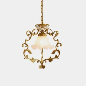 Vintage brass pendant light with pearl accents and frosted glass shade, frontal studio view