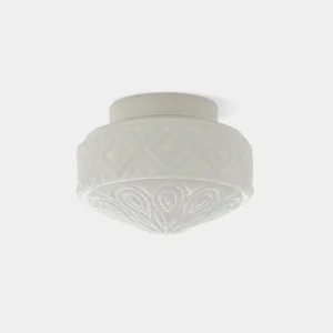 Embossed vintage glass ceiling light fixture with carved diamond and scroll pattern in white finish, front view against studio backdrop