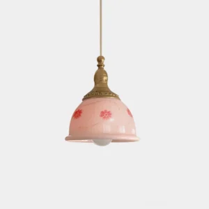Vintage pink ceramic floral pendant light with brass gold hardware displaying hand-painted red flowers and decorative vines