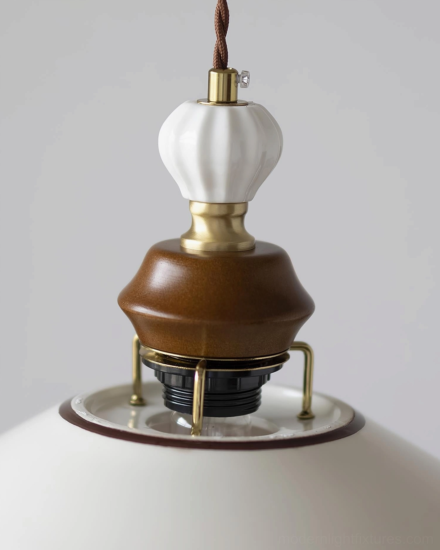 Vintage ceramic pendant light with scalloped ceramic shade, hand-painted artisan details and warm glow