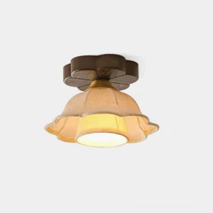 Vintage floral fabric ceiling light with gold brass accents and dark wood base, front close-up view showing delicate flower-shaped shade with scalloped edges
