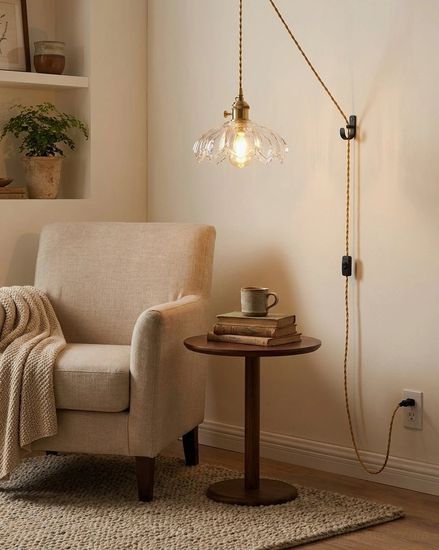 Wall-mounted fluted glass pendant in cozy vintage reading nook with warm atmospheric lighting